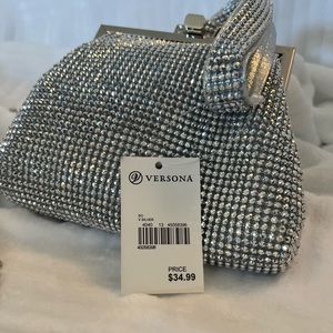 New. Bought to use at a New Year’s wedding and decided on something else.